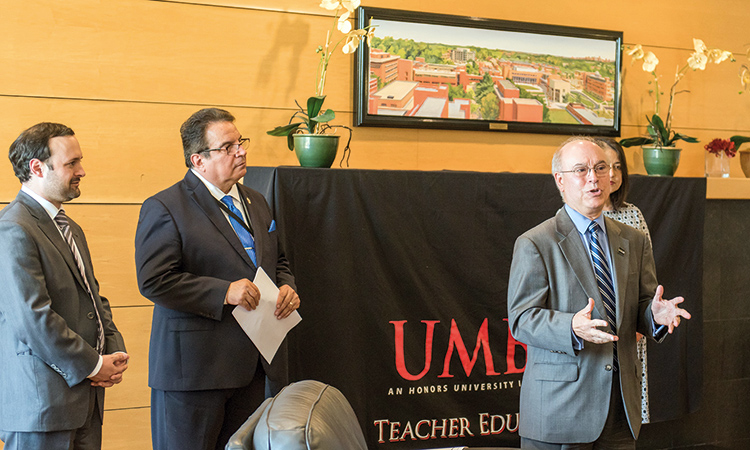 Dr. Antonio Moreira (right) hosting an international event at UMBC